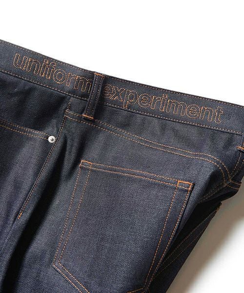 uniform experiment＞RIGID STRETCH DENIM TAPERED PANTS | MAKES