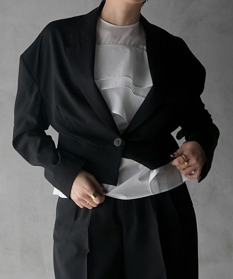 Steep shoulder tailored blazer